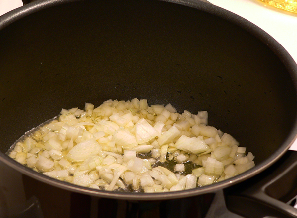 09_Chili-Con-Carne_add-onions Toss in the diced onions.